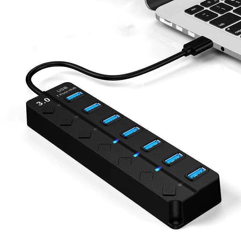 Black seven-port USB 3.0 hub with external power supply and cables