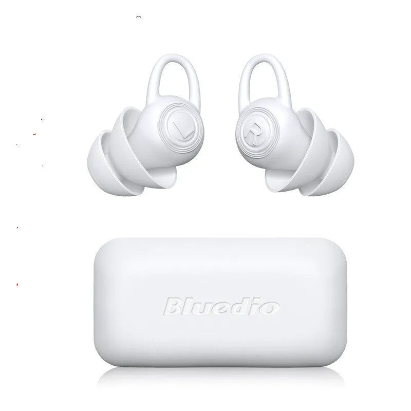 One pair of white soft silicone universal fit ear plugs on a blue background.