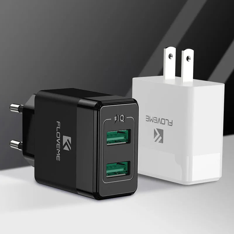Black and white travel charger with US and European plugs for mobile phones