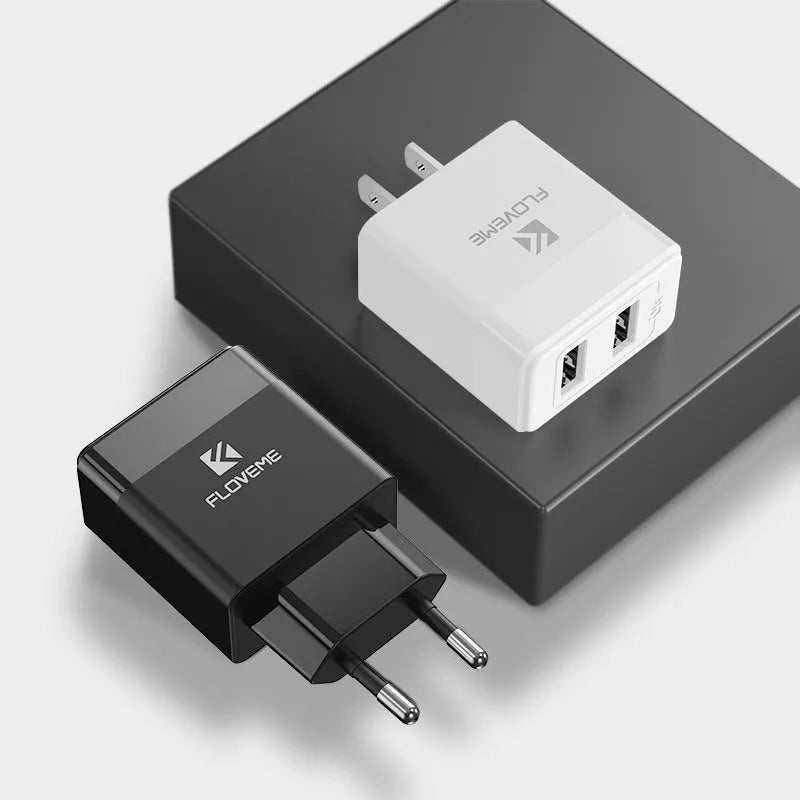 Black and white travel charger with US and European plugs for mobile phones