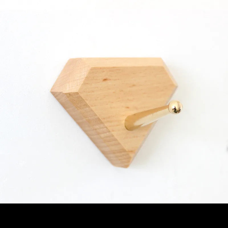 Beech wood adhesive wall hook with brass perforation in five shape options