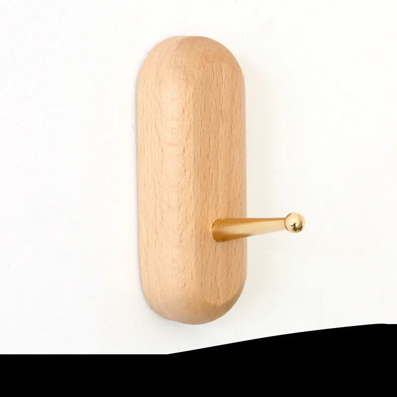 Beech wood adhesive wall hook with brass perforation in five shape options