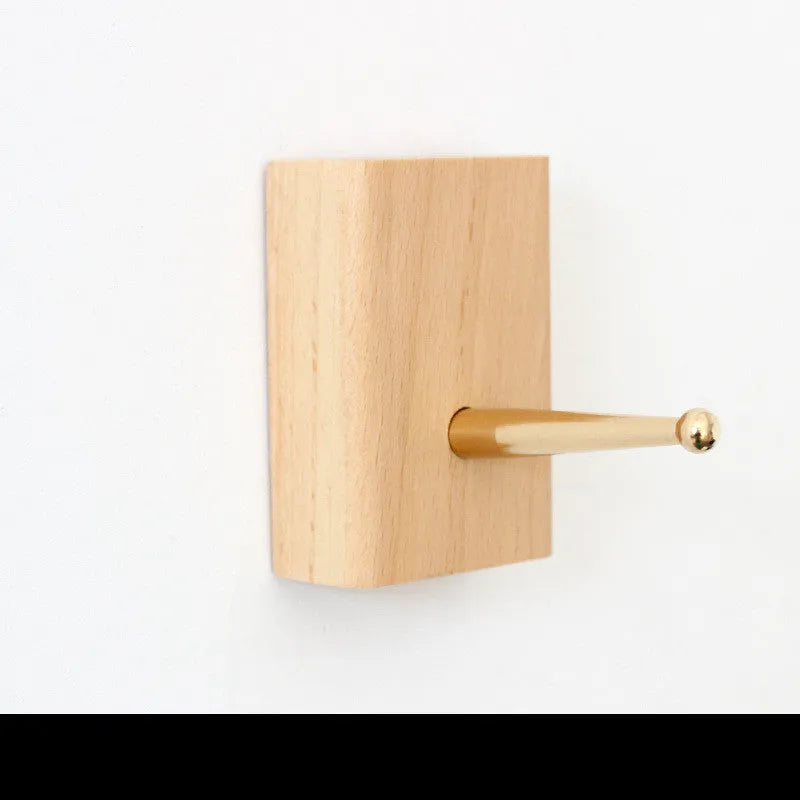 Beech wood adhesive wall hook with brass perforation in five shape options