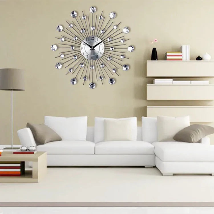 Silver round mute wall clock with metal shell and aluminium dial, 33cm in diameter.