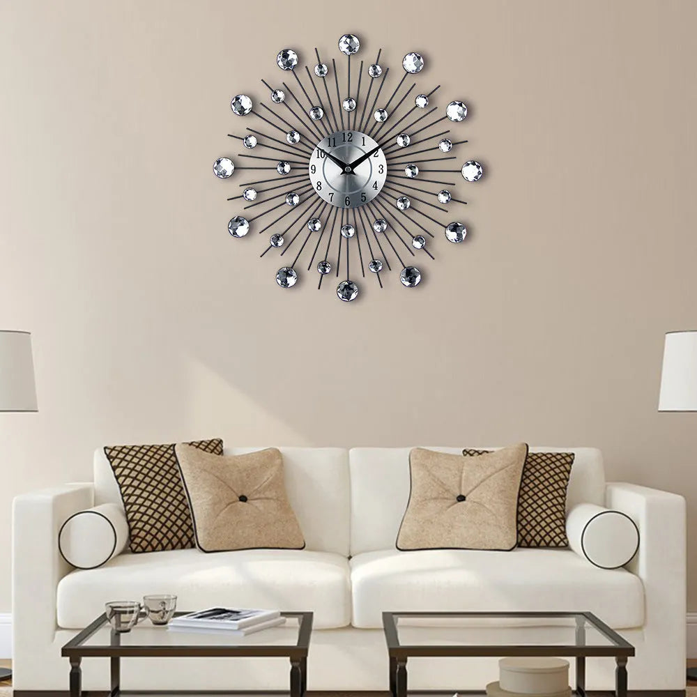 Silver round mute wall clock with metal shell and aluminium dial, 33cm in diameter.