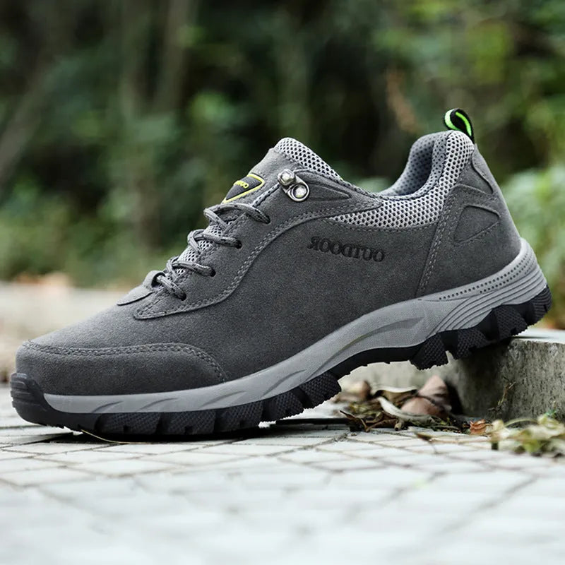 Men's low-cut hiking shoes in army green with breathable mesh lining shown in large sizes