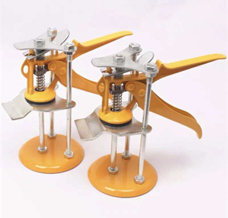 Silver adjustable tile raising locator levelling tool on a work surface