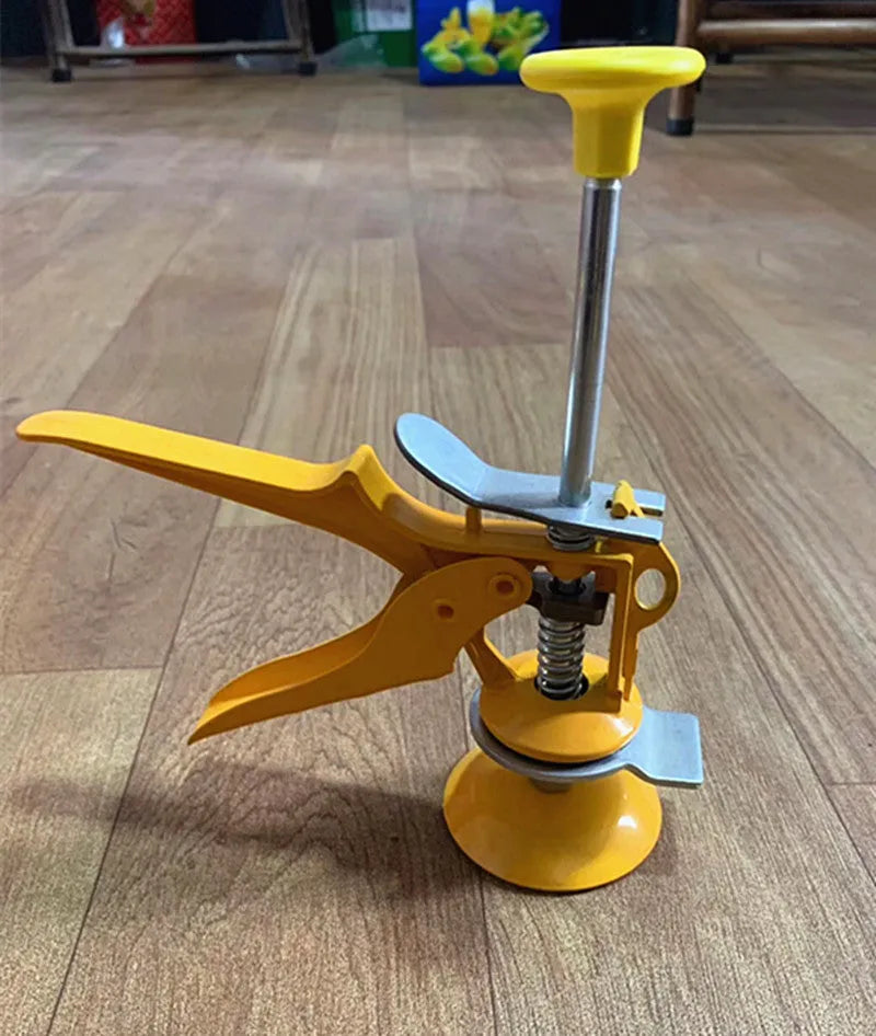 Silver adjustable tile raising locator levelling tool on a work surface
