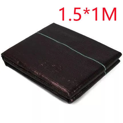 Black woven polyethylene weed-proof cloth laid flat on soil.