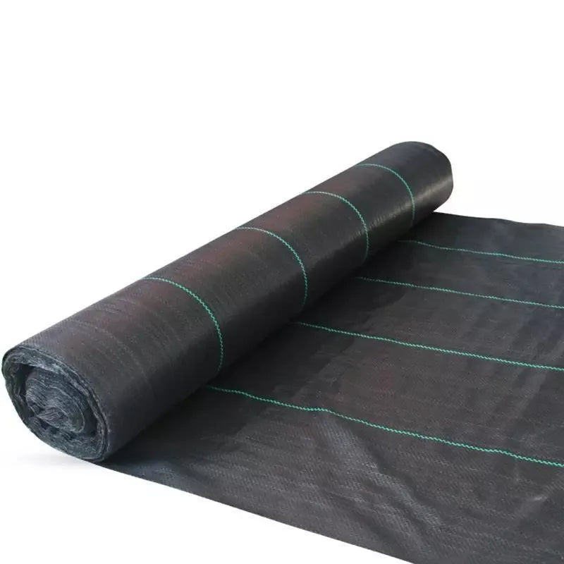 Black woven polyethylene weed-proof cloth laid flat on soil.