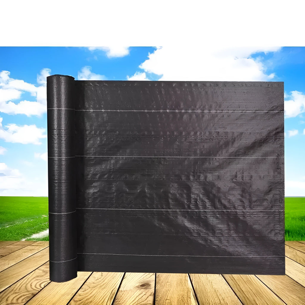 Black woven polyethylene weed-proof cloth laid flat on soil.