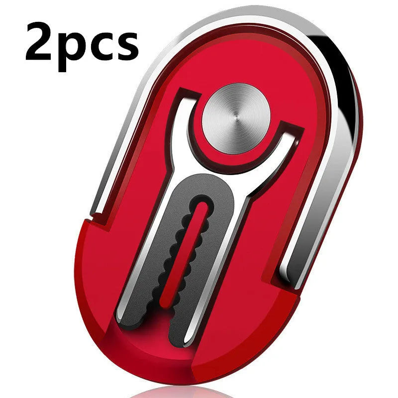 Universal magnetic car phone bracket mounted on vehicle air vent showing 360-degree rotation adjustment