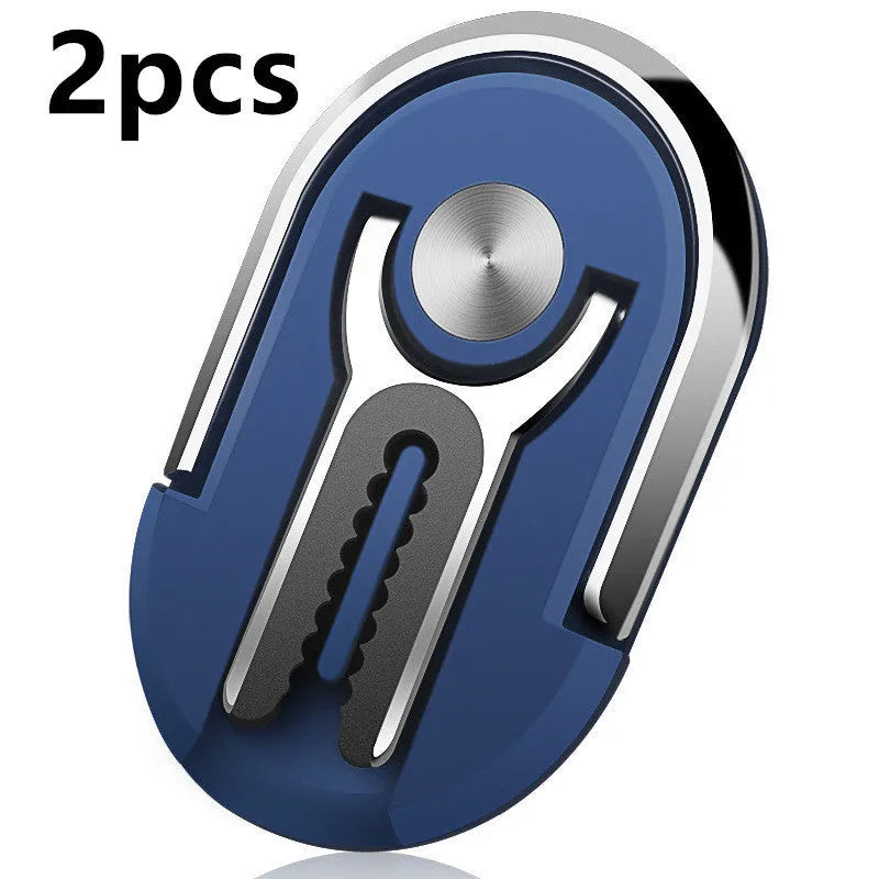 Universal magnetic car phone bracket mounted on vehicle air vent showing 360-degree rotation adjustment