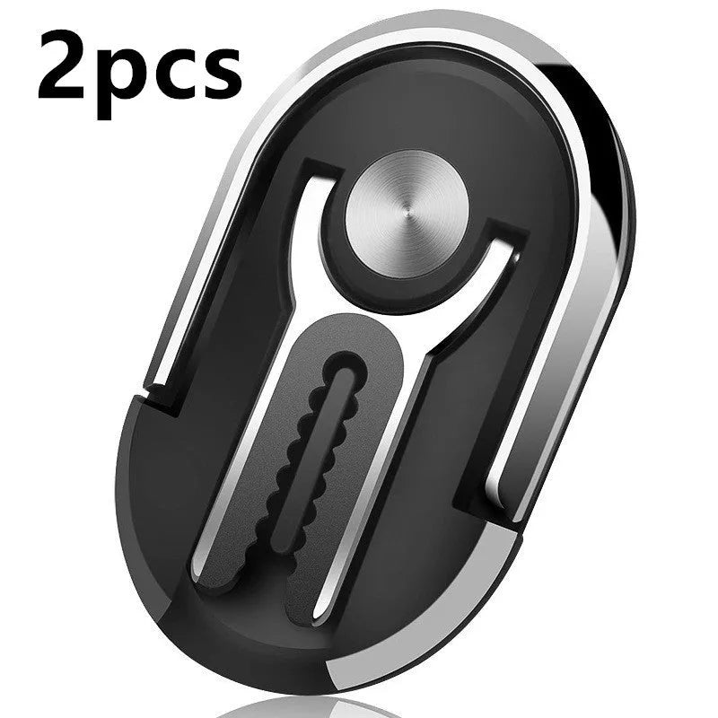 Universal magnetic car phone bracket mounted on vehicle air vent showing 360-degree rotation adjustment