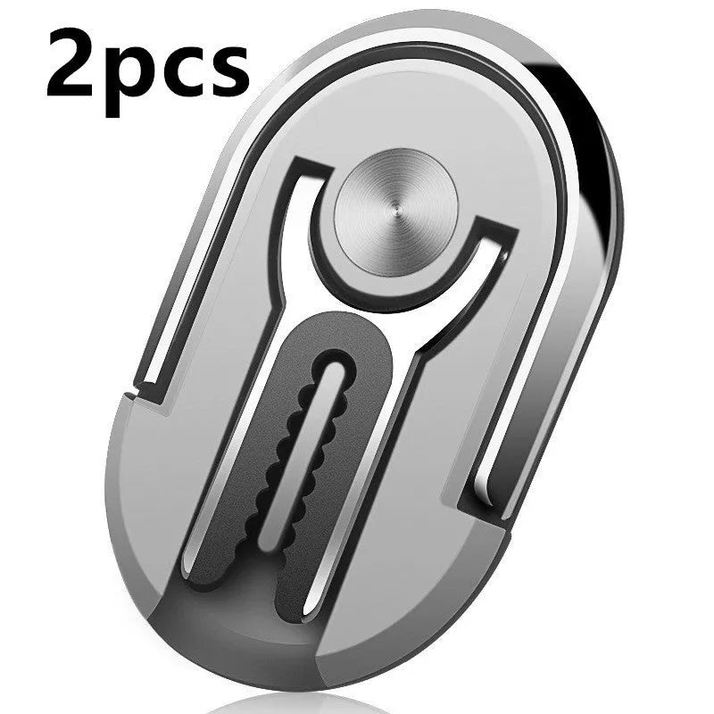 Universal magnetic car phone bracket mounted on vehicle air vent showing 360-degree rotation adjustment