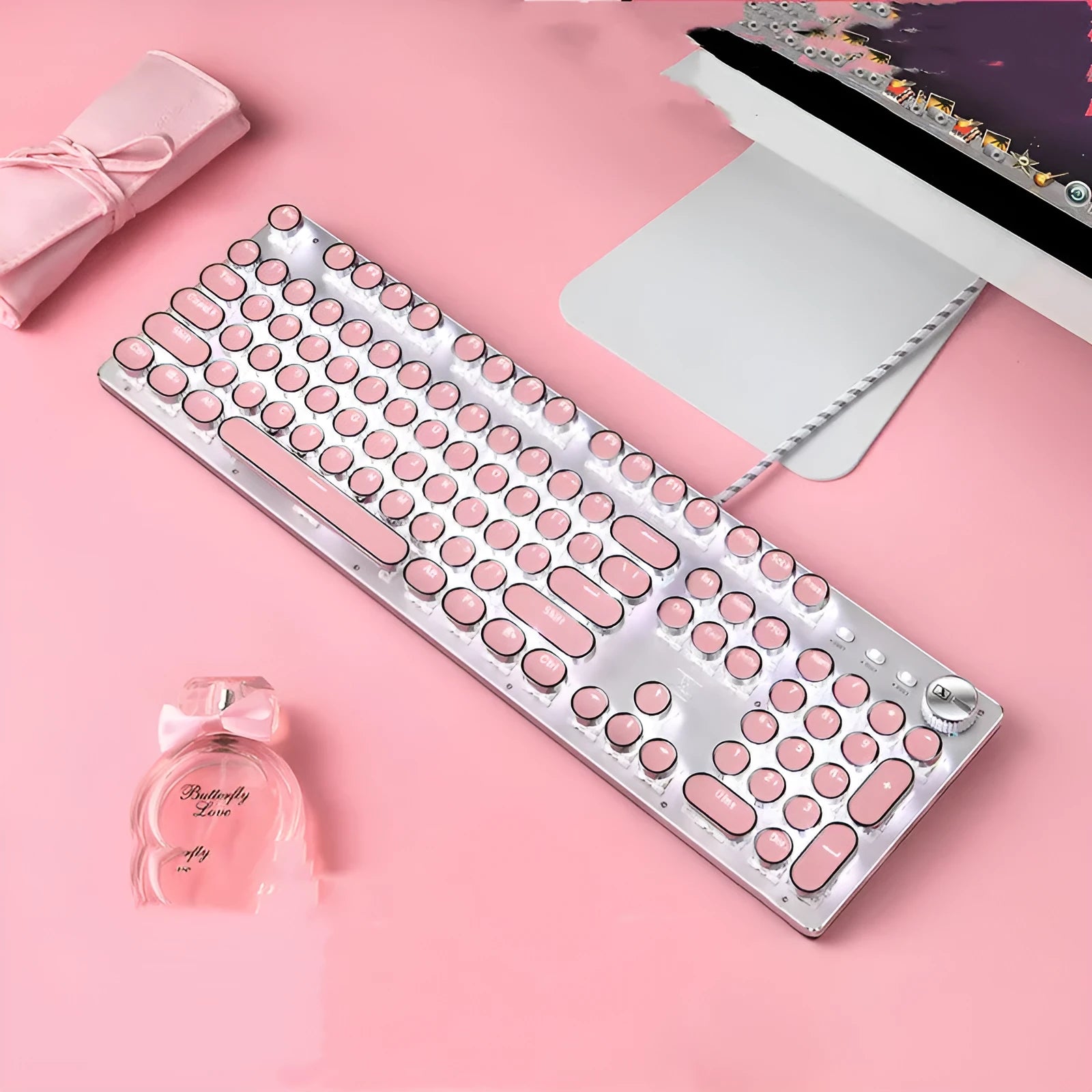 Mechanical keyboard and mouse set with green switches, white LED backlighting on silver base with pink accents
