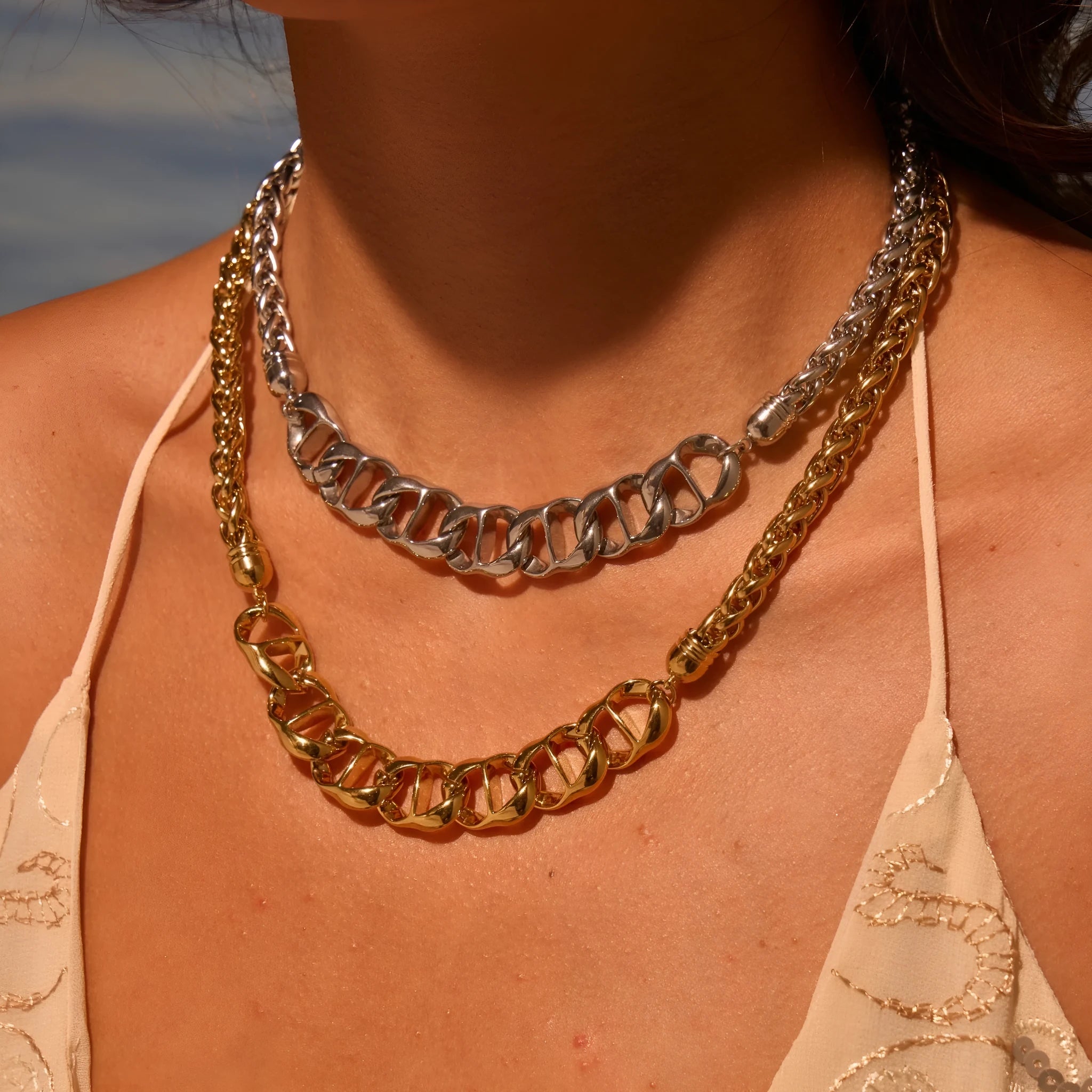 Stainless steel necklace with geometric pendant in gold plated or steel colour options
