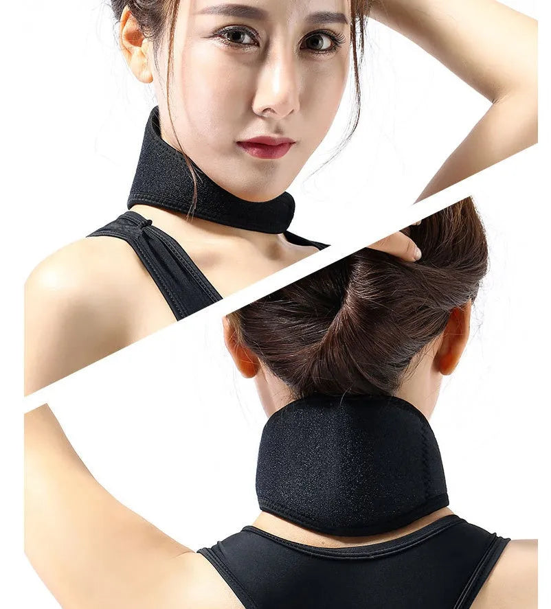 Black self-heating magnetic therapy neck guard with adjustable shoulder strap laid flat