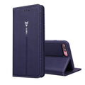 Black PU leather wallet-style case open to show card slots, next to an iPhone.