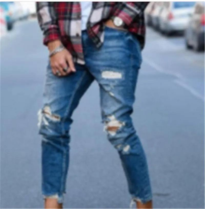 Men's deep blue ripped jeans with distressed hole detailing in 100% cotton fabric