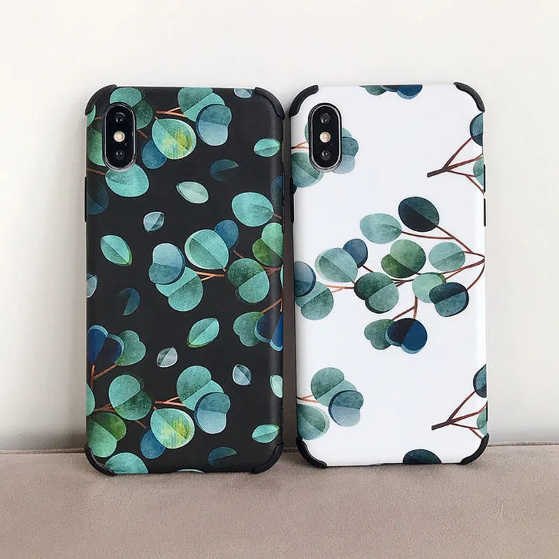 Black silicone iPhone case with a raised leaf pattern design on the back.