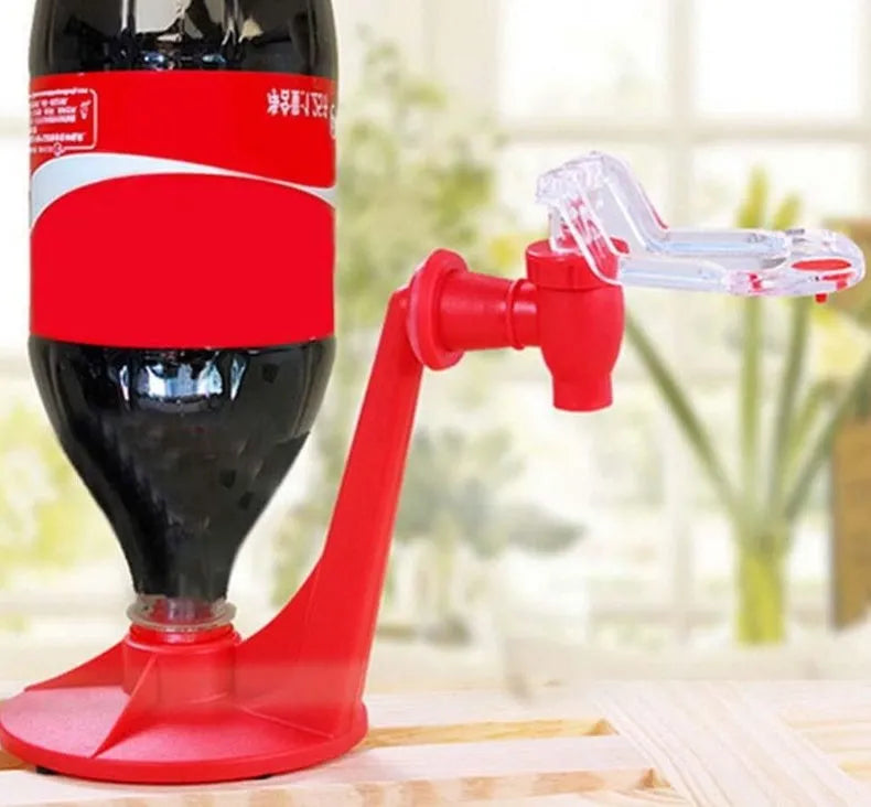 Red plastic Magic Tap soda drink dispenser for 2-litre bottles