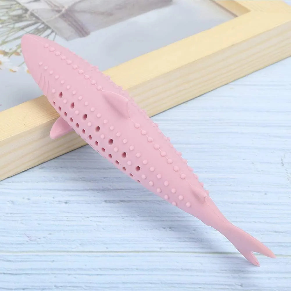 Green silicone fish-shaped cat chew toy with removable parts for catnip, shown on a white background.