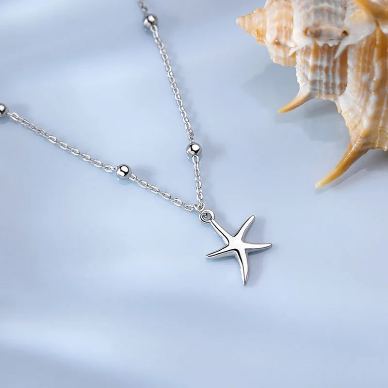 Sterling silver starfish anklet on adjustable beaded chain with lobster clasp