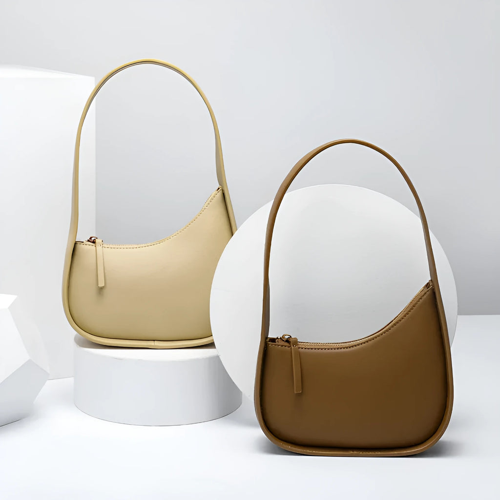Genuine leather half moon shaped women's handbag with wide shoulder strap in four colour options