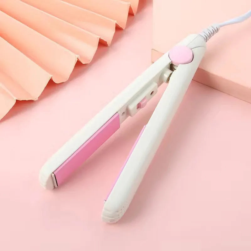 Mini hairdressing splint hair straightener with storage box in blue, pink, purple, white, or yellow colour.