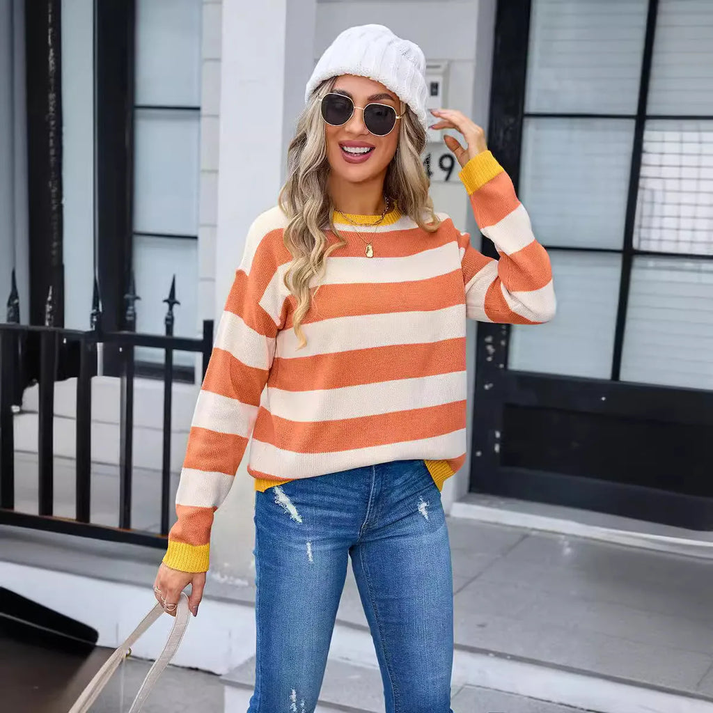 Women's long sleeve loose fit sweater in blue with round neck and knit pattern