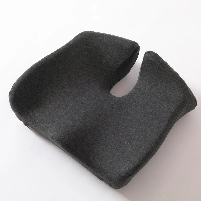 Dark grey memory foam office chair cushion measuring 36x40cm on a desk chair.