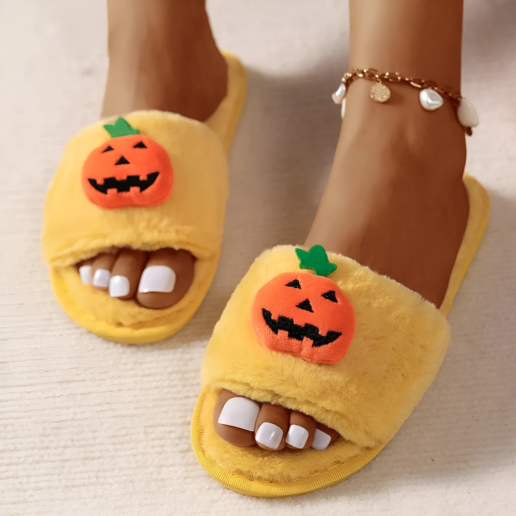 Yellow Halloween pumpkin cartoon design open toe slippers with soft synthetic fur upper.