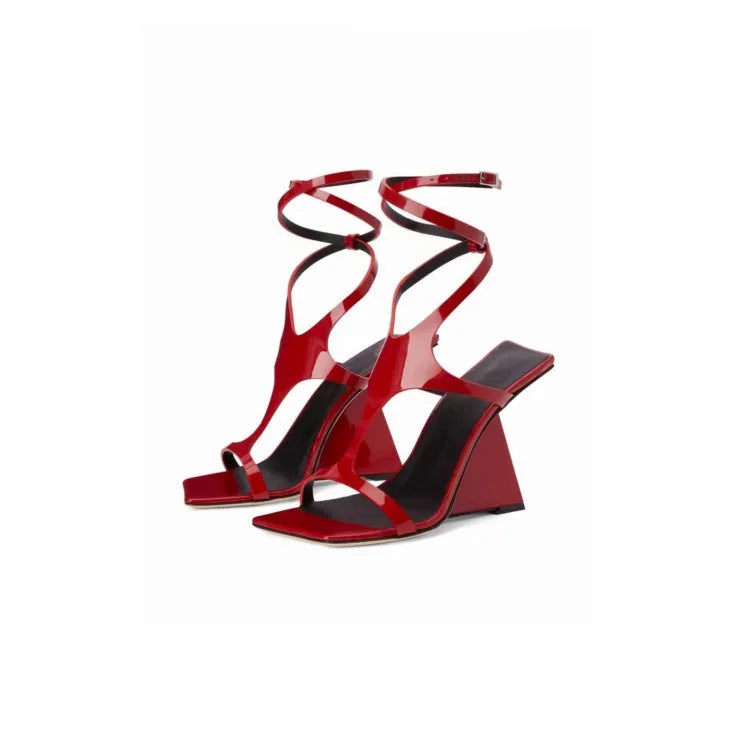 Women's black high heel sandals with a square toe and a 9.5cm rubber heel on a white background.