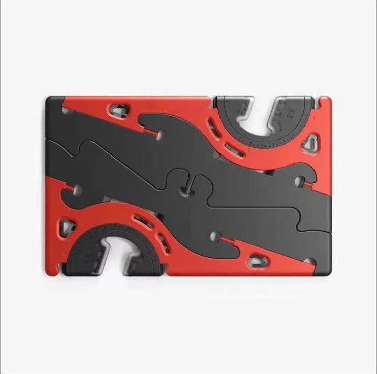 Black plastic card type mobile phone holder for desktop use on a wooden desk