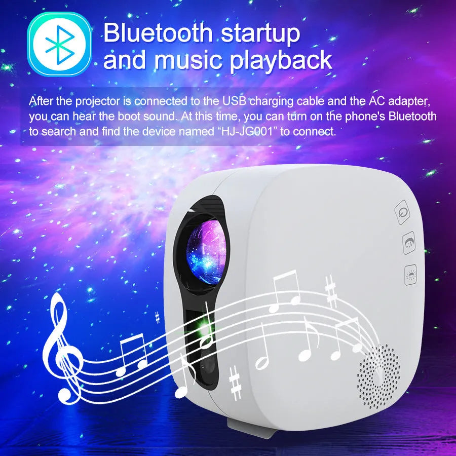 Black laser star projector lamp projecting colourful nebula patterns on wall