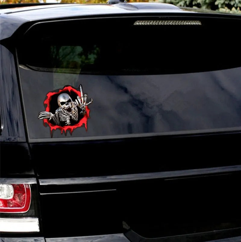 Close-up of colourful broken shell pattern reflective metal skull car sticker, 15cm by 14cm, on PET film.
