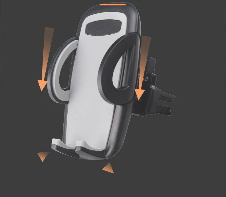 Black car air vent mobile phone holder attached to air conditioning outlet holding smartphone