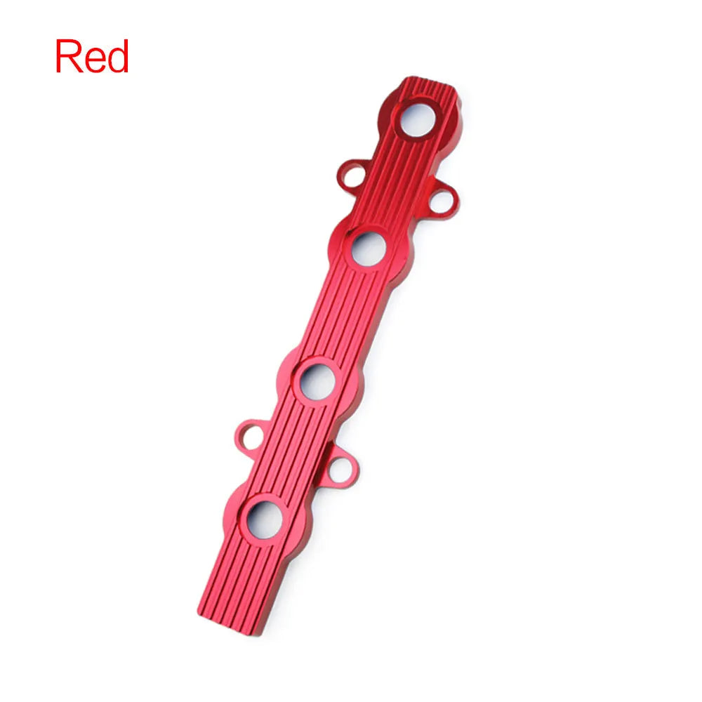 Aluminium alloy engine harness housing bracket in blue, red, and silver, showing versions with and without mounting holes.