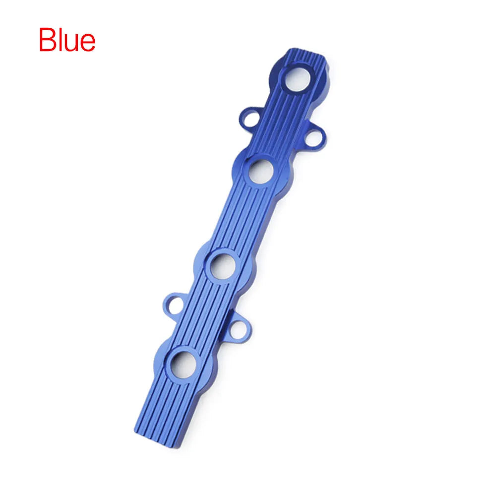 Aluminium alloy engine harness housing bracket in blue, red, and silver, showing versions with and without mounting holes.