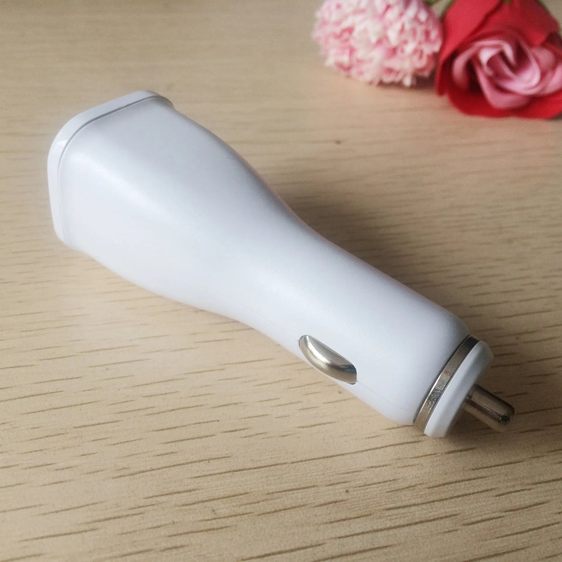 White single-port QC30 fast USB car charger for smartphones with compact design