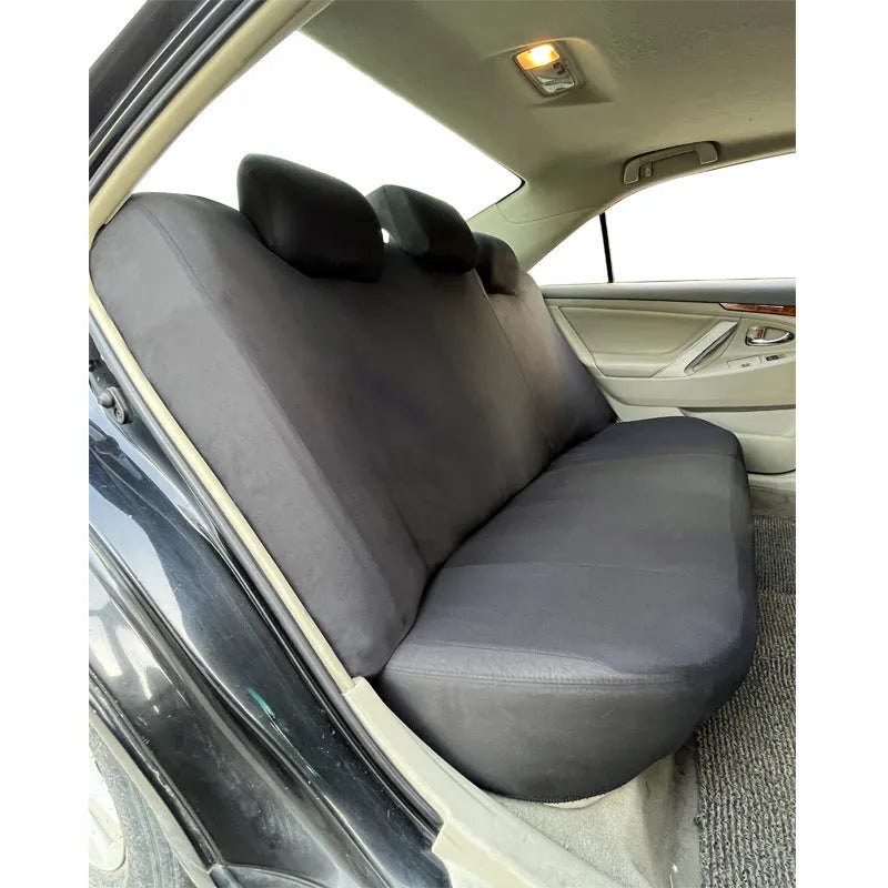Polyester eyelet fabric universal car seat cover set in black, blue, grey, or red.