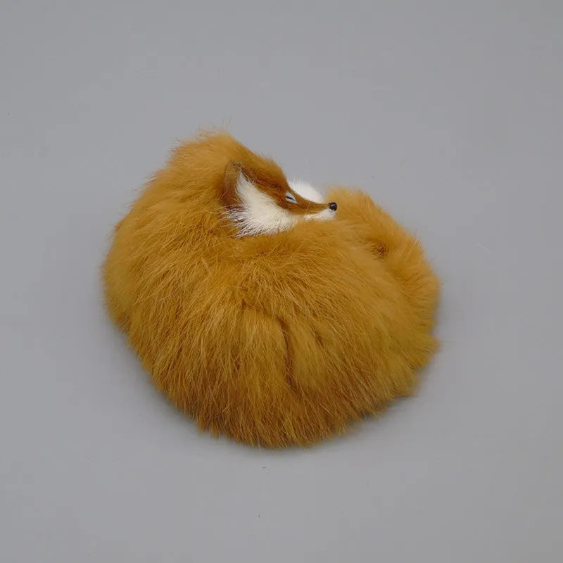Artificial fox fur car decoration in white colour measuring 15cm long for vehicle dashboard display