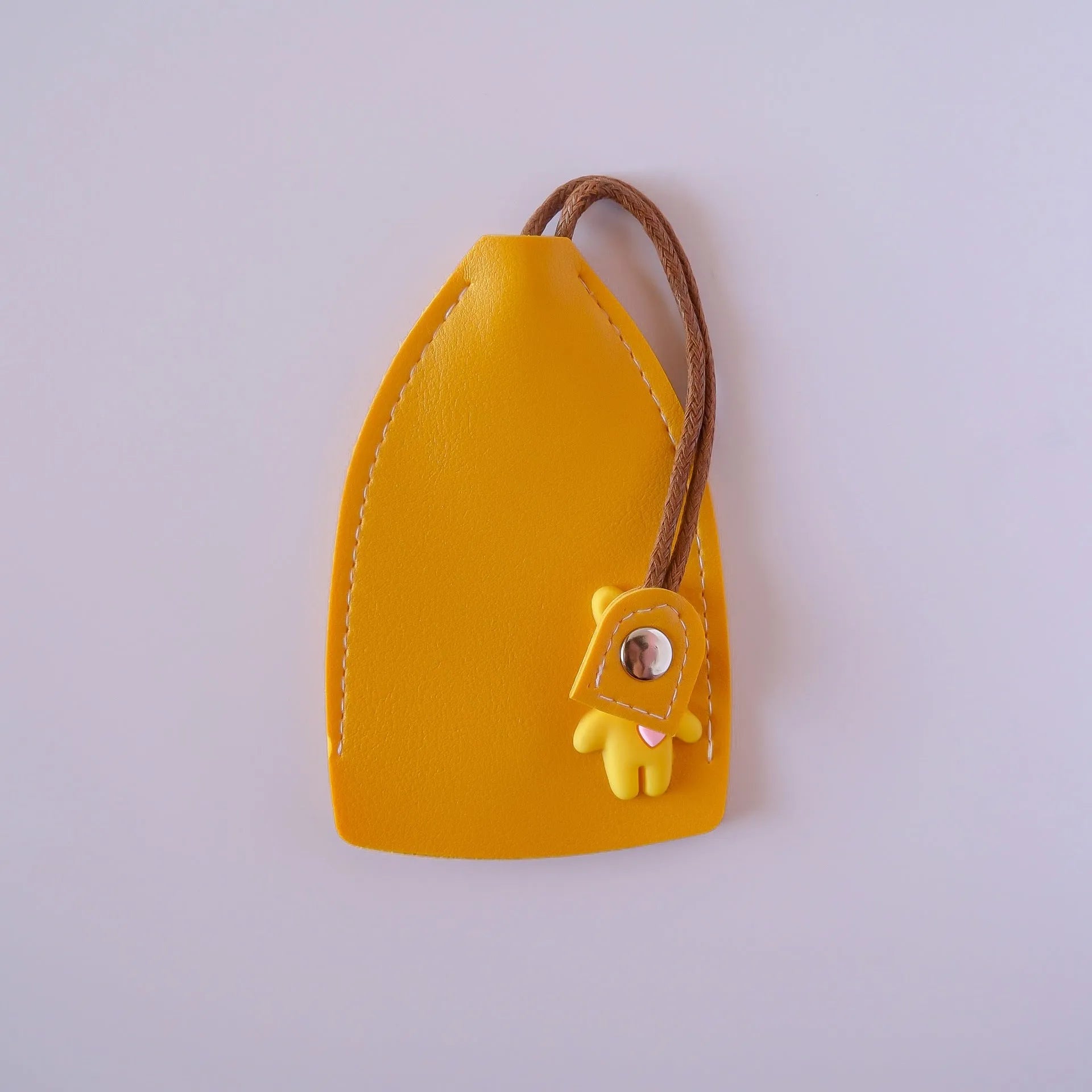 PU leather car key case in various colours showing key fob and credit card storage.