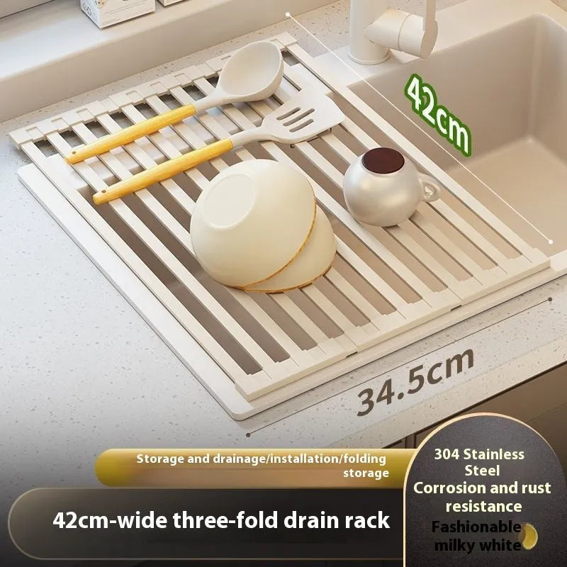 Foldable milky white stainless steel kitchen draining rack shown extended over a sink.