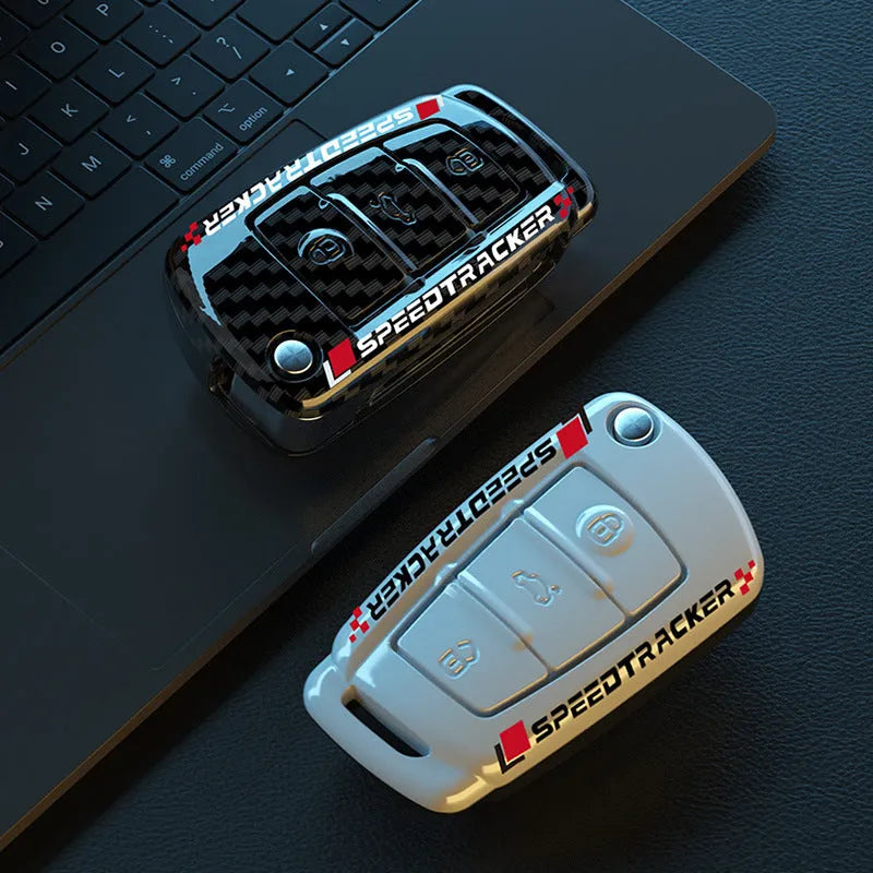 Carbon fibre style car key cover with mirror elements in carbon and white colour options