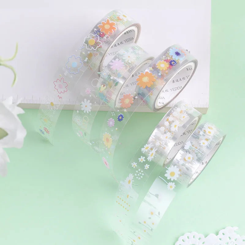 Five rolls of Midsummer Daisy coloured decorative adhesive tape with cartoon design on transparent PET base.