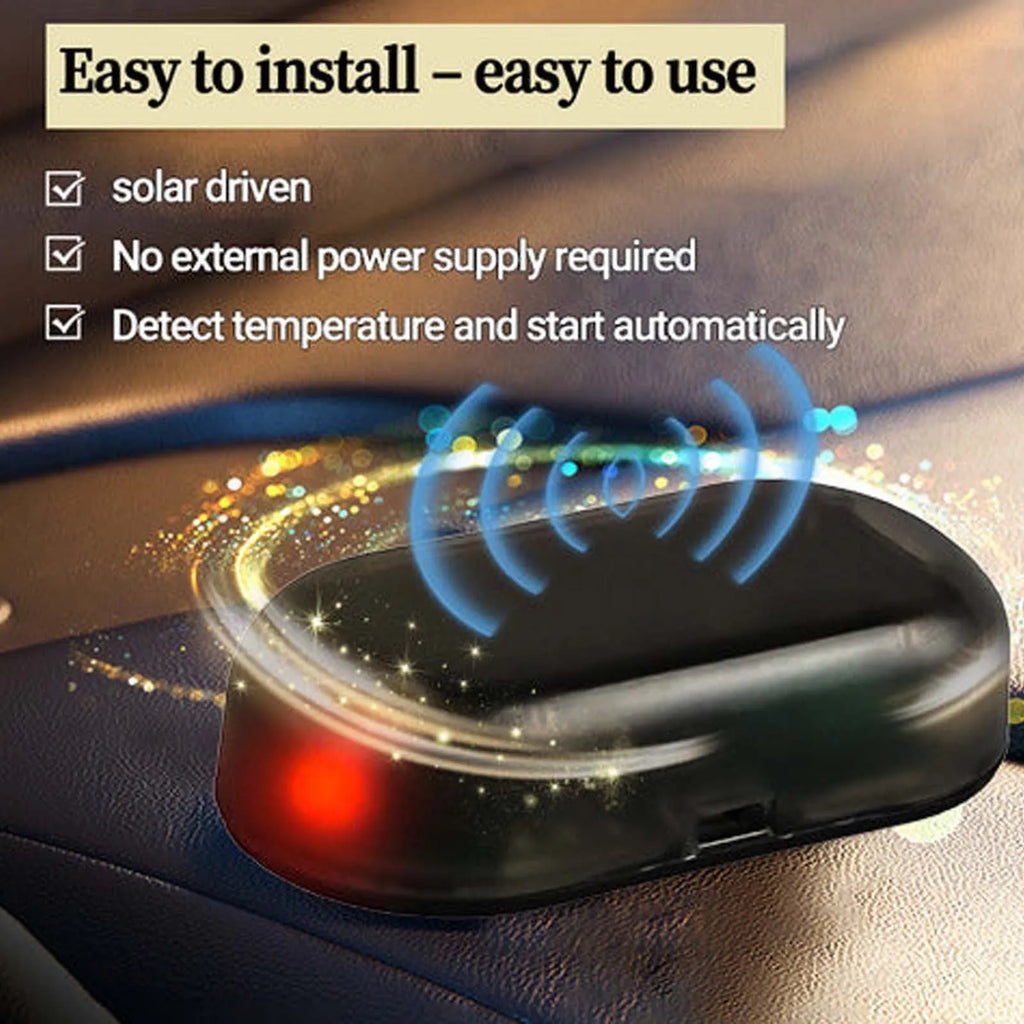 A black handheld car de-icer tool for melting snow and ice on windscreens.