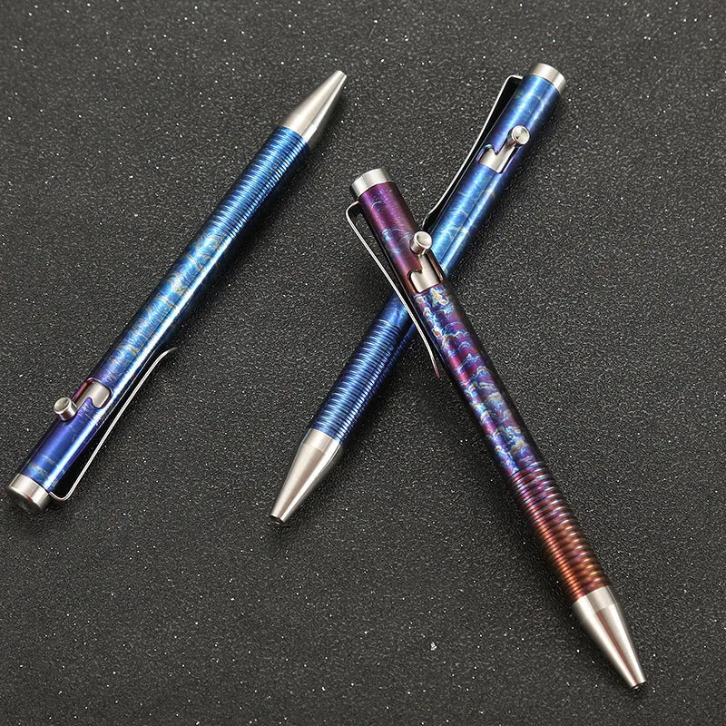 Titanium alloy ball pen with gun bolt handle and iridescent magic colour phantom finish.