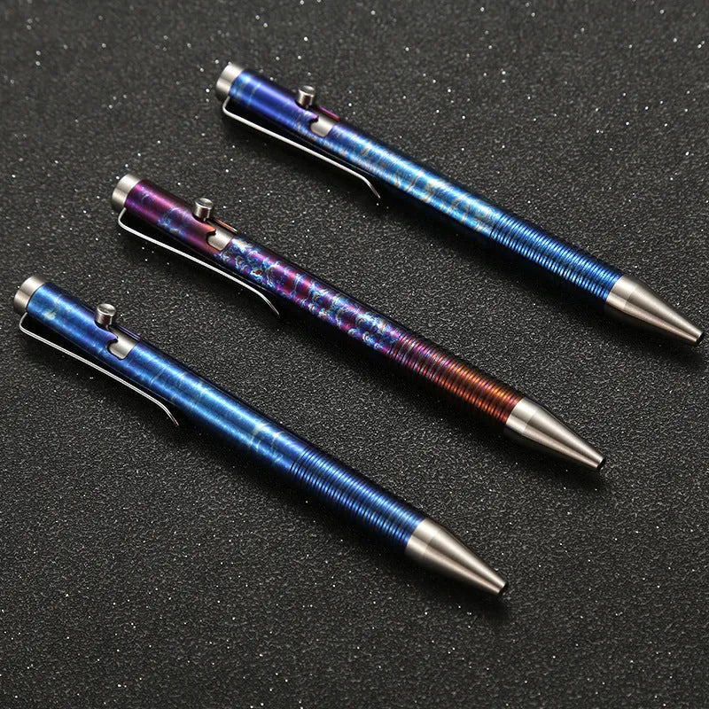 Titanium alloy ball pen with gun bolt handle and iridescent magic colour phantom finish.